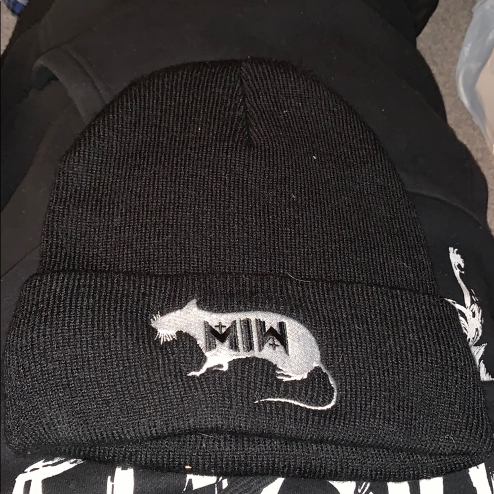 Motionless in white beanie